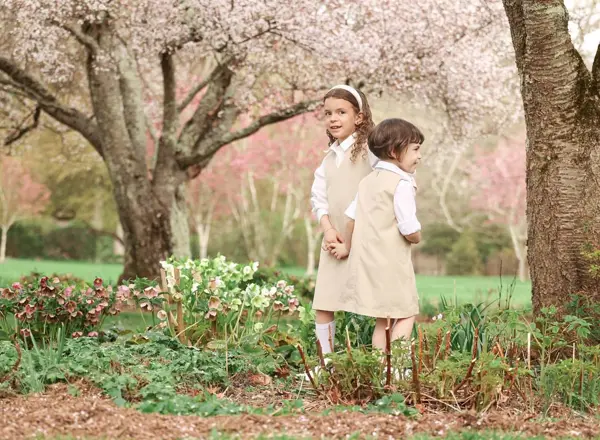 Two siblings under a cherry blossom tree, outdoor photography by Photoholic, Rockland County NY